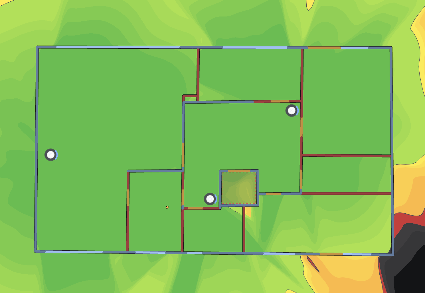Grundriss einer Wohnung mit farbiger WLAN-Ausleuchtung und drei eingezeichneten Access Points